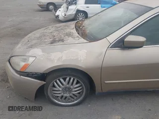 2003 Honda Accord LX with VIN JHMCM563X3C050146, listed as a IAAI auction lot 42451963 with 203,271 mi miles and . Bid and sale history available at DreamBid. Image 16.