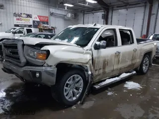 2014 GMC Sierra 1500 SLT with VIN 3GTU2VEC6EG233640, listed as a IAAI auction lot 41480274 with 90,092 mi miles. Bid and sale history available at carsss.com. Image 2.