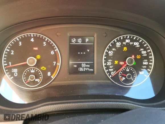 2013 Volkswagen Passat Wolfsburg Edition z VIN 1VWAP7A30DC133893, wystawiony jako Copart lot #82477184 z przebiegiem 136 344 mil mil oraz Szkoda całkowita • Salvage title. Historia ofert i sprzedaży dostępna na DreamBid. Obrazek 9.