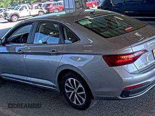 2024 Volkswagen Jetta S with VIN 3VW5M7BU4RM076556, listed as a IAAI auction lot 42852862 with 20,106 mi miles and . Bid and sale history available at DreamBid. Image 2.