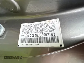 2003 Acura RSX z VIN JH4DC54873S002163, wystawiony jako Copart lot #59033805 z przebiegiem Nie podano mil oraz Szkody całkowita. Historia ofert i sprzedaży dostępna na DreamBid. Obrazek 10.