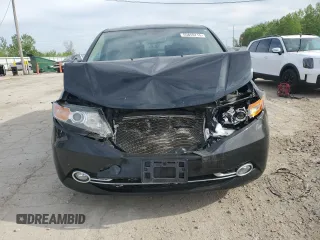 2014 Honda Odyssey Touring z VIN 5FNRL5H94EB006827, wystawiony jako Copart lot #55859715 z przebiegiem 195 131 mil mil oraz Szkoda całkowita • Salvage title. Historia ofert i sprzedaży dostępna na DreamBid. Obrazek 5.