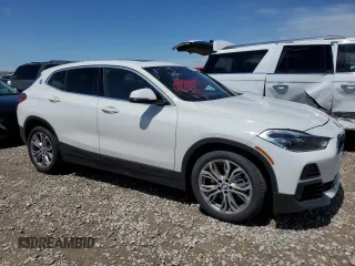 2022 BMW X2 xDrive28i z VIN WBXYJ1C00N5U17584, wystawiony jako Copart lot #55994955 z przebiegiem 21 973 mil mil oraz Czysty tytuł • Clean title. Historia ofert i sprzedaży dostępna na DreamBid. Obrazek 4.