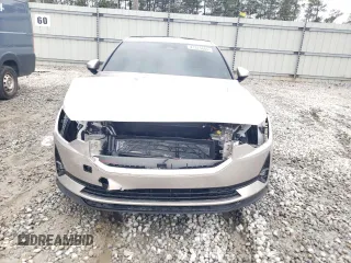 2024 Polestar 2 z VIN YSMFE3KA2RL234238, wystawiony jako Copart lot #41375605 z przebiegiem 8806 mil mil oraz Szkody całkowita. Historia ofert i sprzedaży dostępna na DreamBid. Obrazek 5.