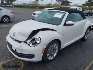 2013 Volkswagen Beetle Convertible 2.5L with VIN 3VW5P7AT9DM825439, listed as a IAAI auction lot 41760907 with 53,649 mi miles. Bid and sale history available at carsss.com. Image 2.