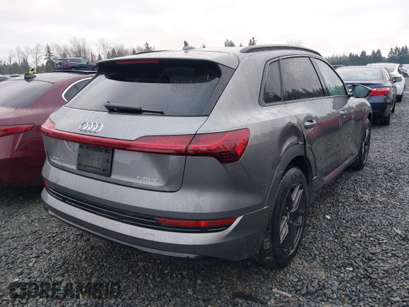 2021 Audi e-tron Premium with VIN WA1AAAGE8MB010823, listed as a IAAI auction lot 41254590 with 21,171 mi miles. Bid and sale history available at carsss.com. Image 4.