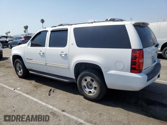 2014 Chevrolet Suburban LT with VIN 1GNSKJE79ER112840, listed as a Copart auction lot 64709074 with Not Provided miles and Salvage Title. Bid and sale history available at DreamBid. Image 2.