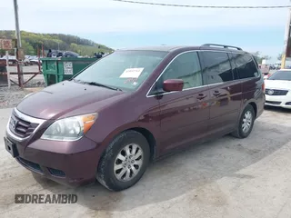 2008 Honda Odyssey EX-L with VIN 5FNRL38748B402957, listed as a IAAI auction lot 42092761 with 142,927 mi miles. Bid and sale history available at carsss.com. Image 2.