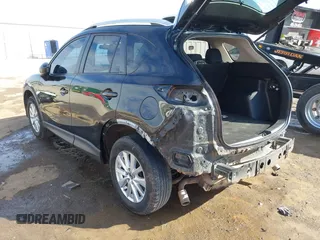 2014 Mazda CX-5 Sport with VIN JM3KE4BE6E0388909, listed as a IAAI auction lot 41876514 with 196,882 mi miles. Bid and sale history available at carsss.com. Image 3.