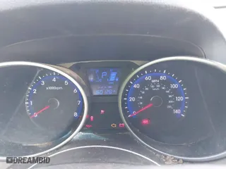 2015 Hyundai Tucson SE with VIN KM8JU3AG4FU058762, listed as a IAAI auction lot 38662024 with 160,128 mi miles. Bid and sale history available at carsss.com. Image 7.
