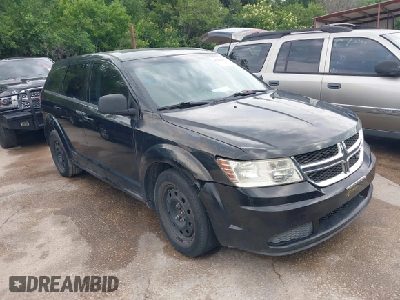 2013 Dodge Journey SE z VIN 3C4PDCAB6DT709917, wystawiony jako IAAI lot #42361943 z przebiegiem 196 891 mil mil oraz . Historia ofert i sprzedaży dostępna na DreamBid. Obrazek 1.