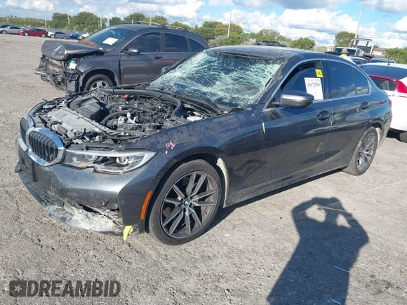 2021 BMW 3 Series 330i xDrive with VIN 3MW5R7J01M8B49173, listed as a IAAI auction lot 41672538 with 82,259 mi miles and . Bid and sale history available at carsss.com. Image 2.