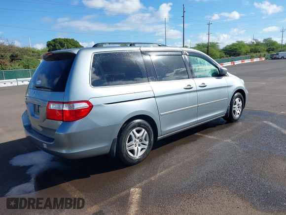2007 Honda Odyssey EX-L with VIN 5FNRL38677B021464, listed as a IAAI auction lot 41568582 with 131,359 mi miles and . Bid and sale history available at DreamBid. Image 4.