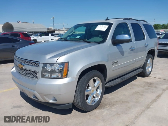 2013 Chevrolet Tahoe LT with VIN 1GNSCBE07DR164486, listed as a IAAI auction lot 42216421 with 220,395 mi miles and . Bid and sale history available at DreamBid. Image 17.