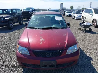 2003 Mazda Protege DX with VIN JM1BJ225930195479, listed as a IAAI auction lot 42199689 with 148,382 mi miles and . Bid and sale history available at DreamBid. Image 6.