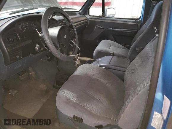 1993 Ford F-150 with VIN 1FTEX14N2PKB50753, listed as a Copart auction lot 61099185 with 144,074 mi miles and Salvage title. Bid and sale history available at DreamBid. Image 7.