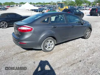 2015 Ford Fiesta SE z VIN 3FADP4BJ7FM158471, wystawiony jako IAAI lot #42090819 z przebiegiem 139 779 mil mil oraz . Historia ofert i sprzedaży dostępna na DreamBid. Obrazek 4.