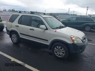 2005 Honda CR-V EX with VIN JHLRD78825C063303, listed as a IAAI auction lot 41945409 with 174,841 mi miles. Bid and sale history available at carsss.com. Image 1.
