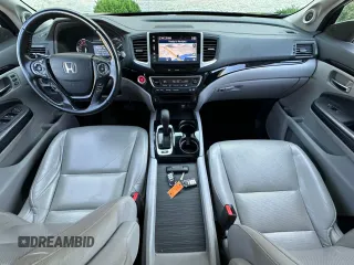 2019 Honda Ridgeline RTL-E with VIN 5FPYK3F71KB009532, listed as a Copart auction lot 65827935 with 217,177 mi miles and Clean title. Bid and sale history available at DreamBid. Image 9.