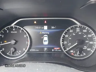 2021 Nissan Maxima SV with VIN 1N4AA6CV9MC513687, listed as a IAAI auction lot 41744440 with 67,386 mi miles and . Bid and sale history available at DreamBid. Image 7.
