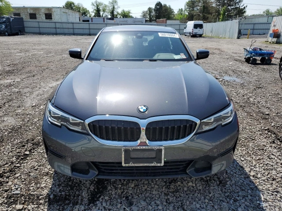 2021 BMW 3 Series 330i xDrive with VIN WBA5R7C00MFK50404, listed as a Copart auction lot 56010064 with 22,905 mi miles. Bid and sale history available at carsss.com. Image 5.