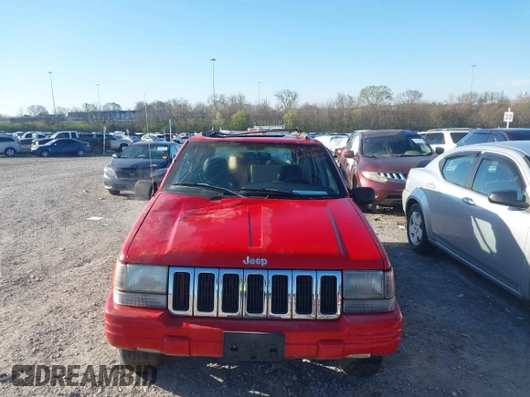 1998 Jeep Grand Cherokee Laredo with VIN 1J4GZ48Y6WC290798, listed as a IAAI auction lot 41816161 with 299,875 mi miles. Bid and sale history available at carsss.com. Image 12.