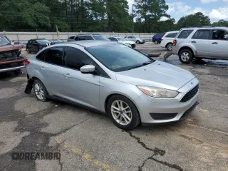 2017 Ford Focus SE with VIN 1FADP3F29HL242325, listed as a Copart auction lot 61153555 with 136,666 mi miles and Salvage title. Bid and sale history available at DreamBid. Image 4.