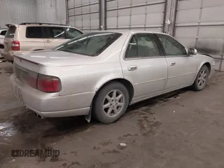 2003 Cadillac Seville Luxury SLS z VIN 1G6KS54Y93U200813, wystawiony jako IAAI lot #41544661 z przebiegiem 159 550 mil mil oraz . Historia ofert i sprzedaży dostępna na DreamBid. Obrazek 4.