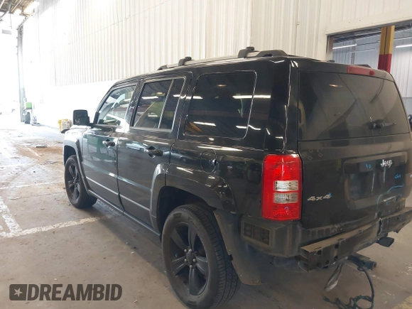 2014 Jeep Patriot Limited with VIN 1C4NJRCB4ED629085, listed as a IAAI auction lot 39414215 with 87,409 mi miles. Bid and sale history available at carsss.com. Image 3.