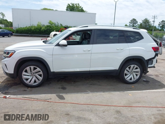 2021 Volkswagen Atlas SEL with VIN 1V2BR2CA4MC541523, listed as a IAAI auction lot 42326498 with 84,090 mi miles and . Bid and sale history available at DreamBid. Image 14.