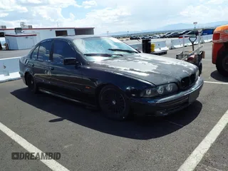 1997 BMW 5 Series 540i z VIN WBADE6325VBW51961, wystawiony jako IAAI lot #42408546 z przebiegiem 180 790 mil mil oraz . Historia ofert i sprzedaży dostępna na DreamBid. Obrazek 1.
