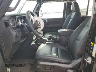 2024 Jeep Wrangler Sahara with VIN 1C4PJXEG8RW262661, listed as a Copart auction lot 55464325 with 561 mi miles and Salvage title. Bid and sale history available at DreamBid. Image 7.
