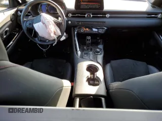 2022 Toyota Supra 3.0 z VIN WZ1DB0C09NW049985, wystawiony jako Copart lot #68956213 z przebiegiem 18 457 mil mil oraz . Historia ofert i sprzedaży dostępna na DreamBid. Obrazek 8.