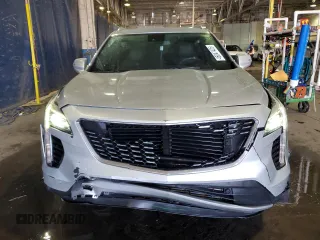 2021 Cadillac XT4 FWD Premium Luxury z VIN 1GYFZCR44MF024208, wystawiony jako Copart lot #46047425 z przebiegiem 40 044 mil mil oraz Nie do naprawy • Non repairable. Historia ofert i sprzedaży dostępna na DreamBid. Obrazek 5.