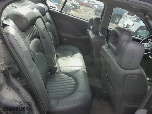 2002 Pontiac Bonneville SE with VIN 1G2HX54K424142844, listed as a Copart auction lot 51410025 with 172,081 mi miles and Salvage Title. Bid and sale history available at carsss.com. Image 10.