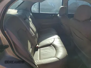 2000 Lincoln Continental with VIN 1LNHM97V4YY832947, listed as a Copart auction lot 83350184 with 164,389 mi miles and Salvage Title. Bid and sale history available at carsss.com. Image 10.