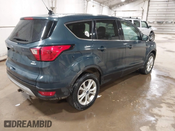 2019 Ford Escape SE z VIN 1FMCU9GD2KUA31904, wystawiony jako IAAI lot #41843341 z przebiegiem 125 605 mil mil oraz . Historia ofert i sprzedaży dostępna na DreamBid. Obrazek 4.