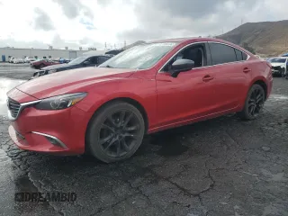 2016 Mazda 6 i Grand Touring with VIN JM1GJ1W56G1468307, listed as a Copart auction lot 87386504 with 158,841 mi miles and Salvage Title. Bid and sale history available at DreamBid. Image 1.