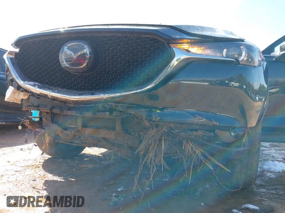 2020 Mazda CX-5 Touring z VIN JM3KFBCMXL1741182, wystawiony jako IAAI lot #41602315 z przebiegiem 31 582 mil mil oraz . Historia ofert i sprzedaży dostępna na DreamBid. Obrazek 6.