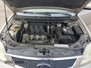 2005 Ford Five Hundred SE with VIN 1FAFP26135G148147, listed as a Copart auction lot 84011184 with 216,546 mi miles and Salvage Title. Bid and sale history available at carsss.com. Image 11.