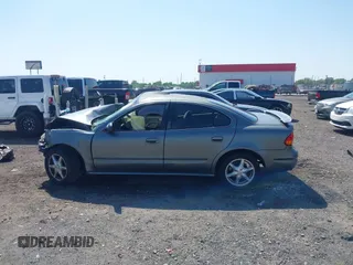 2004 Oldsmobile Alero GL1 with VIN 1G3NL52E74C160903, listed as a IAAI auction lot 42029384 with 135,086 mi miles and . Bid and sale history available at DreamBid. Image 14.