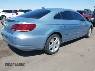 2013 Volkswagen CC Sport with VIN WVWBP7AN0DE567504, listed as a IAAI auction lot 42003695 with 174,528 mi miles. Bid and sale history available at carsss.com. Image 4.