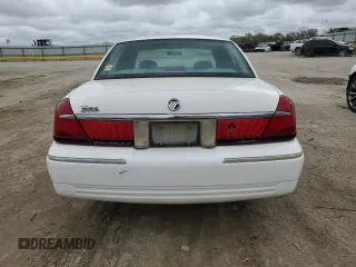 1999 Mercury Grand Marquis GS z VIN 2MEFM74W0XX670924, wystawiony jako Copart lot #51811055 z przebiegiem 176 559 mil mil oraz Szkoda całkowita • Salvage title. Historia ofert i sprzedaży dostępna na DreamBid. Obrazek 6.