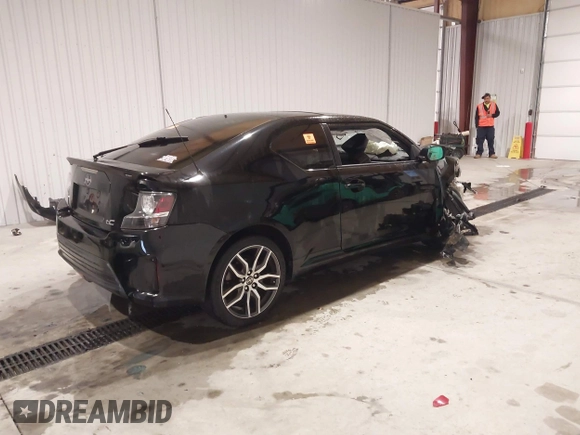 2014 Scion tC z VIN JTKJF5C74E3086243, wystawiony jako IAAI lot #40983287 z przebiegiem Nie podano mil oraz . Historia ofert i sprzedaży dostępna na DreamBid. Obrazek 4.