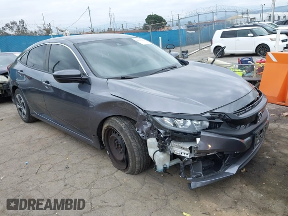 2020 Honda Civic LX with VIN 2HGFC2F64LH576765, listed as a IAAI auction lot 41881444 with 32,129 mi miles and . Bid and sale history available at DreamBid. Image 1.