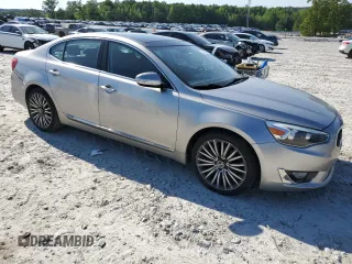 2014 Kia Cadenza Premium with VIN KNALN4D70E5133832, listed as a Copart auction lot 51389574 with 113,266 mi miles and Salvage Title. Bid and sale history available at carsss.com. Image 4.