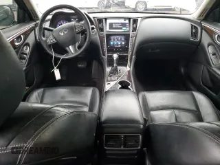 2015 Infiniti Q50 Premium with VIN JN1BV7AR1FM394225, listed as a Copart auction lot 52984735 with 128,305 mi miles and Salvage Title. Bid and sale history available at carsss.com. Image 8.
