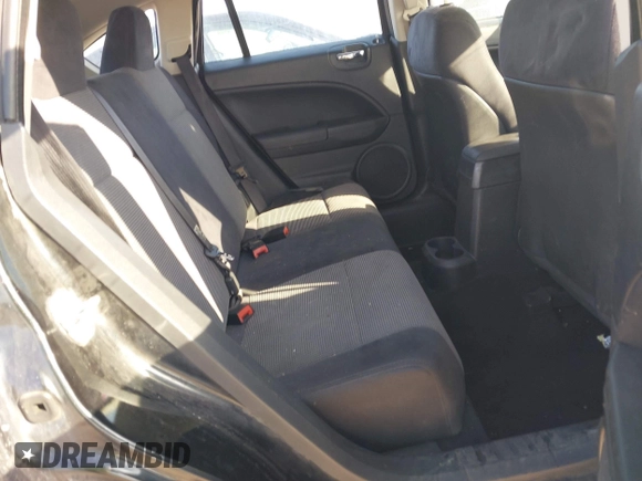 2010 Dodge Caliber SXT with VIN 1B3CB4HA4AD651946, listed as a IAAI auction lot 41771139 with 165,663 mi miles and . Bid and sale history available at DreamBid. Image 8.