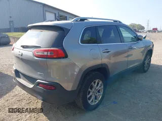 2016 Jeep Cherokee Altitude with VIN 1C4PJMCB0GW108819, listed as a IAAI auction lot 40198342 with 128,949 mi miles and . Bid and sale history available at DreamBid. Image 4.
