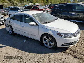 2013 Volkswagen CC R-Line with VIN WVWBP7AN3DE504011, listed as a Copart auction lot 73289984 with 102,081 mi miles and Clean Title. Bid and sale history available at carsss.com. Image 4.